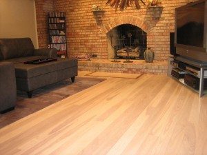 Ash Floor In Living Room with fireplace