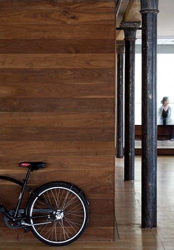 Wood Flooring On Walls With Bike